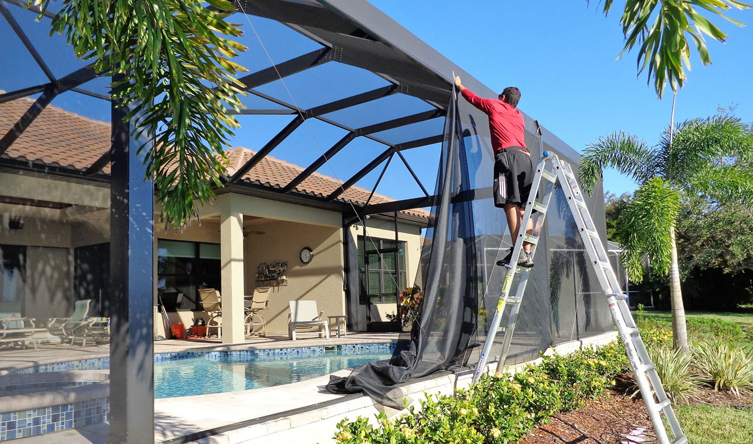 Best Rescreen technician installing lanai screen